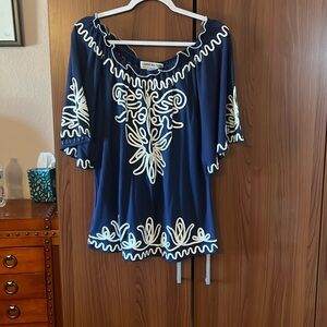 Navy blue with white embroidery